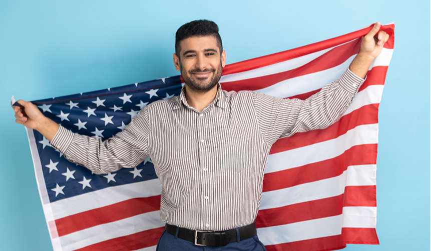 Happy Immigrant EB-5 Investor Holding American Flag