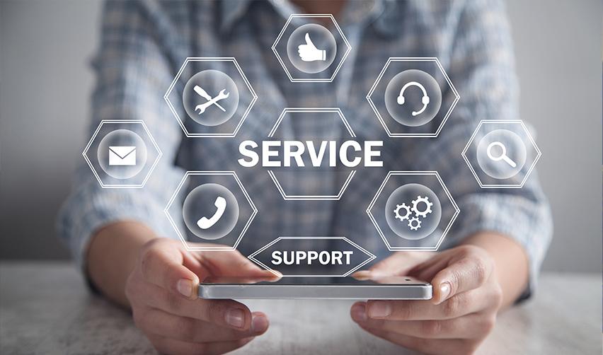 A person holding a smartphone with icons about service providers hovering above it, with the words