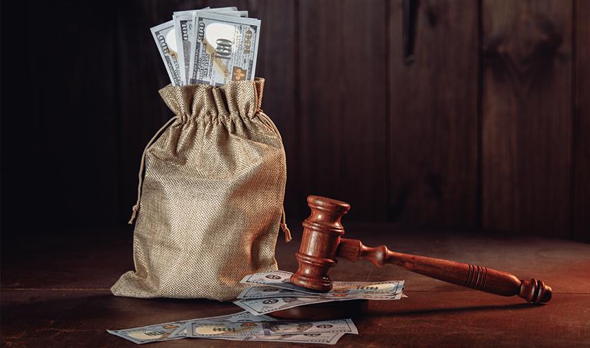 A bag of money representing capital investment funds, next to a judge's gavel representing updated regulations.