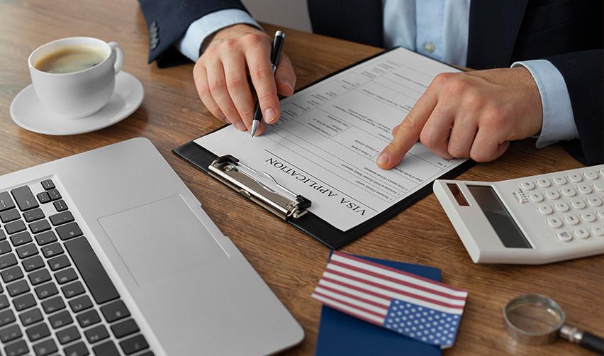 An immigration attorney doing necessary adjustments on adjustment of status applications for applicants chargeable from high demand countries.