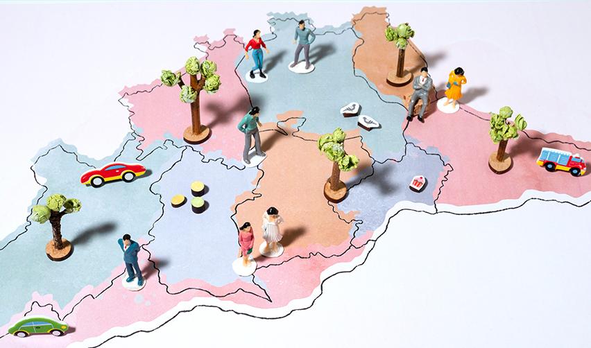 A map with different figurines on it, each symbolizing a new commercial enterprise or job creating entity in a TEA.