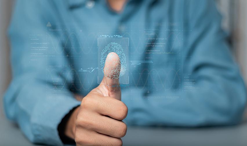 An EB5 investor giving his fingerprint to the United States Citizenship and Immigration Services as part of his citizenship by naturalization application.