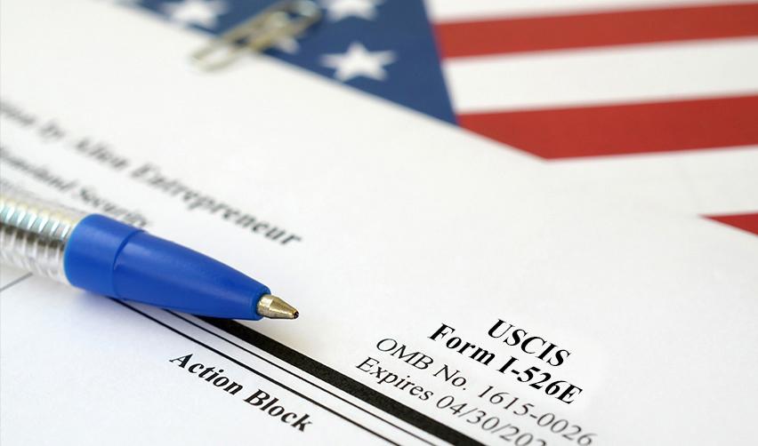 Close-up of a USCIS Form I-526E, immigrant petition by alien entrepreneur, for the EB5 preference category under employment based preference categories.