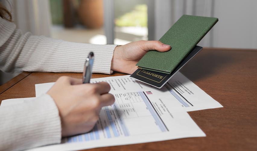 An EB5 investor filling out some visa application supporting documents.