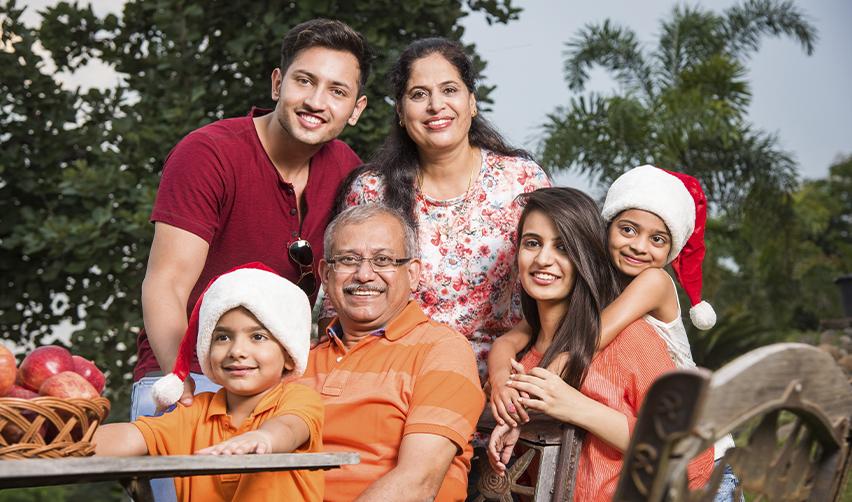 A family of Indian EB5 investors posing for the camera.