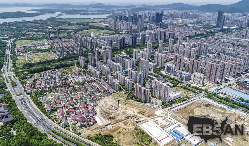 A project development site in a tier 2 or tier 3 city, with the EB5AN logo on the corner.
