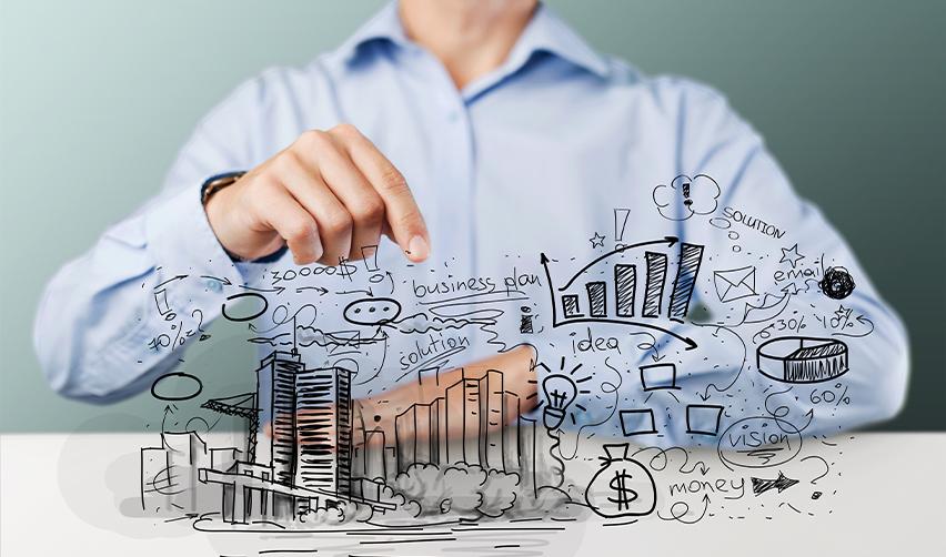 An EB5 investor who applied for a green card through investment in real estate, behind a hand-drawn image of a real estate project.