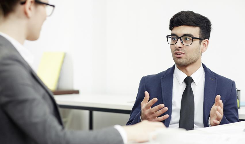 An EB5 investor discussing the USCIS policy update with a regional center managing partner.