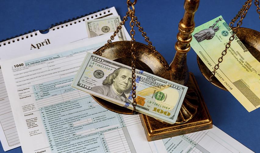 A scale with money and tax-related documents, referring to balancing lawful source of funds for EB5 visa applications, including the importance of accurate tax filings and financial evidence.