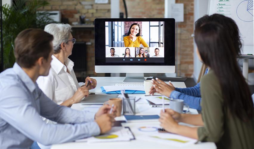 Team participating in a virtual EB5 industry webinar, highlighting collaboration, education, and staying updated on EB5 program insights and investment opportunities.