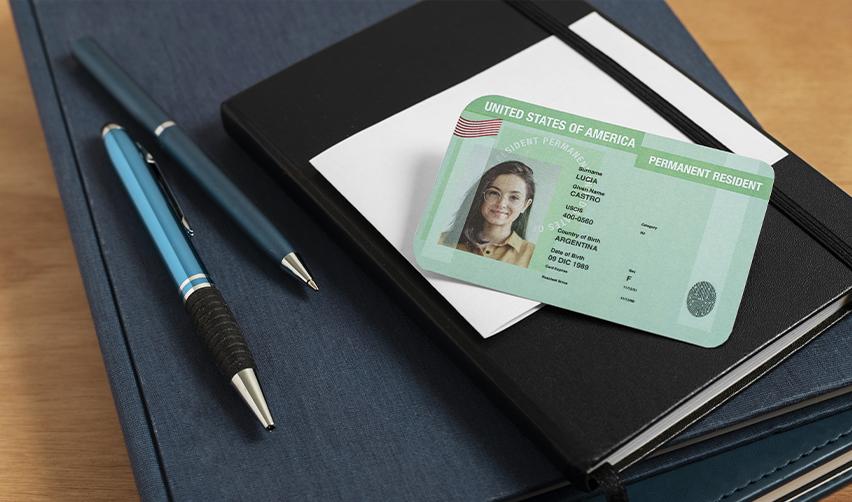 A US Green Card symbolizing the benefits of the EB5 Program for skilled foreign workers navigating Trump administration uncertainties, with processing handled by the United States Citizenship and Immigration Services.