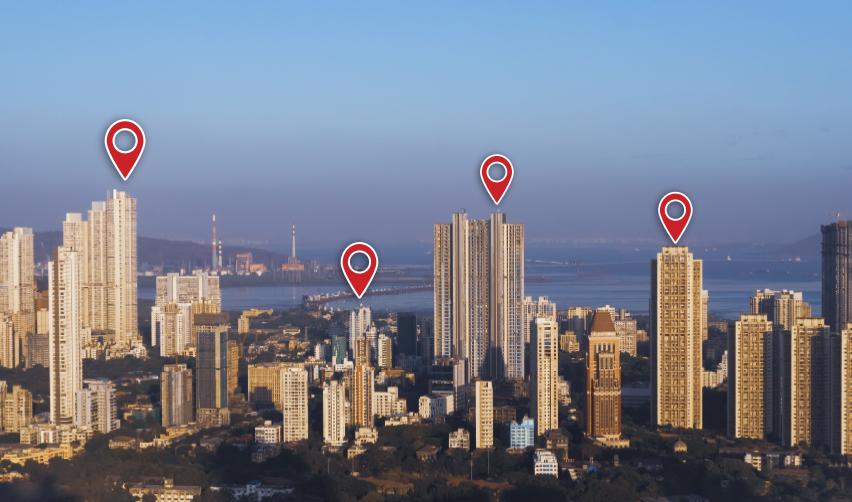 A cityscape with location pins highlighting potential investment areas for green cards under the EB5 program, leading to permanent resident status.