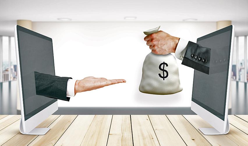 A conceptual image of a digital financial transaction, with one hand extending money and another hand reaching out, representing online lending and bank financing options for EB5 investors.