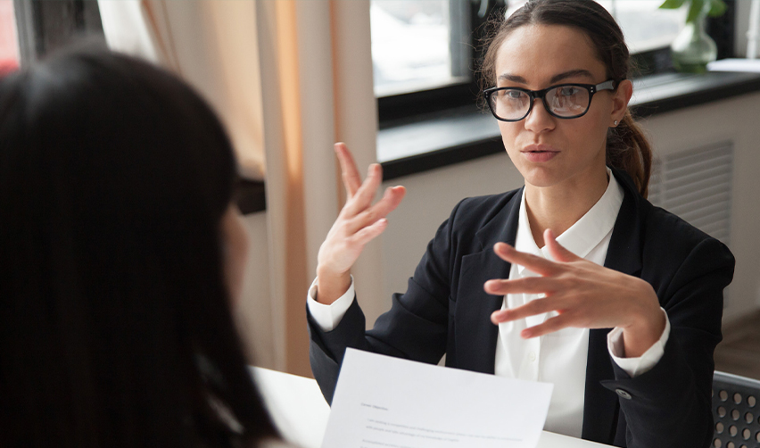 Professional regional center advisor explaining EB5 investment details during a consultation, illustrating the structured support available to investors through reputable EB5 firms like EB5AN.