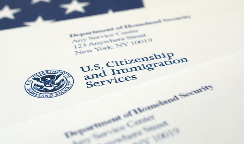 Close-up of official US Citizenship and Immigration Services paperwork, highlighting the legal and immigration aspects of the EB5 investment visa process.