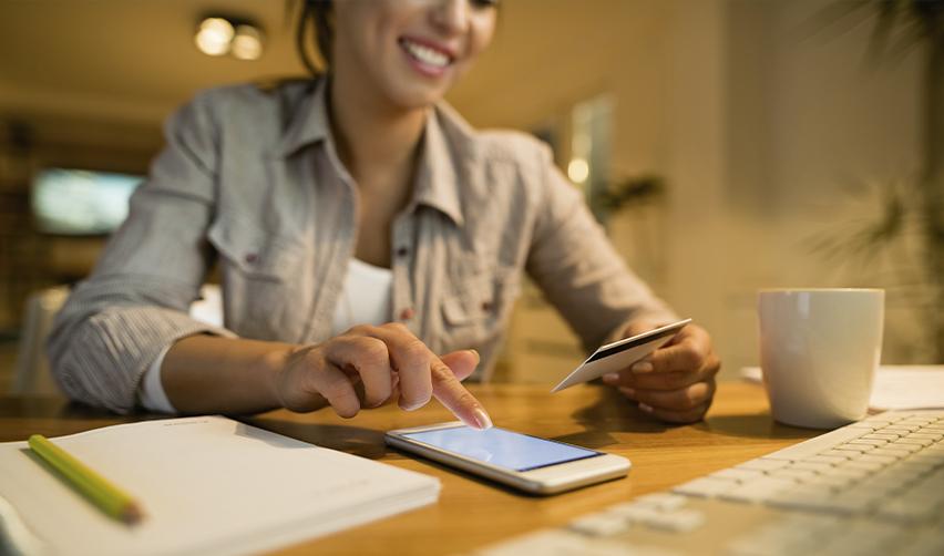 EB5 investor performing a secure test wire transfer to verify banking details before making a full investment.