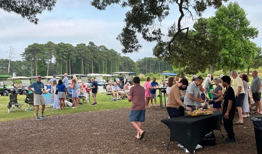 Residents of Bay Creek coming together at a picnic event.