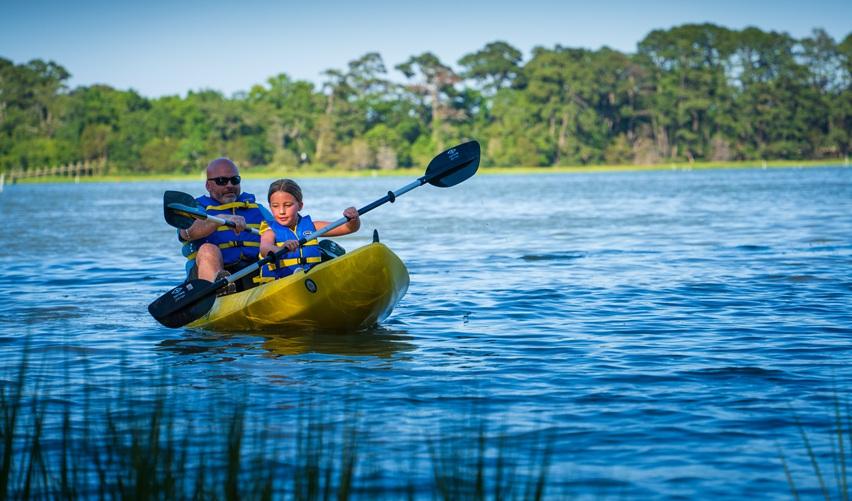 A photo from Bay Creek' first Kayak Experience on Old Plantation Creek, where residents paddled the waters alongside the Bay Creek team.