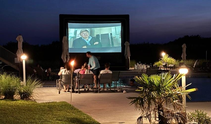 Bay Creek residents enjoying an outdoor movie night.