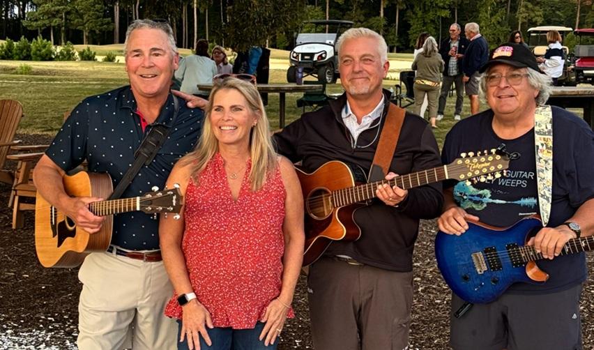 Local musicians performing at Bay Creek’s Friday Live event, bringing residents together with live music and a welcoming atmosphere.