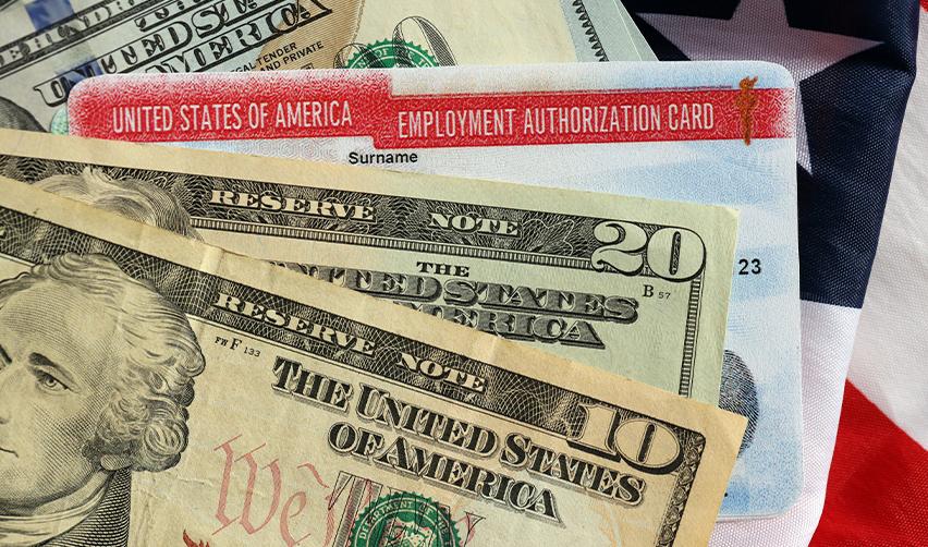 Close-up of U.S. dollar bills and an Employment Authorization Card against an American flag background, symbolizing EB5 investors gaining work and travel authorization through concurrent filing.