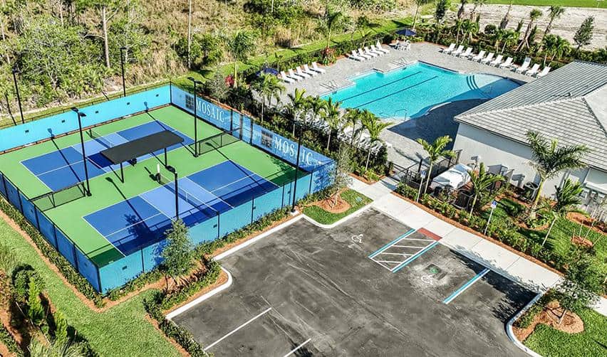 A tennis court and swimming pool