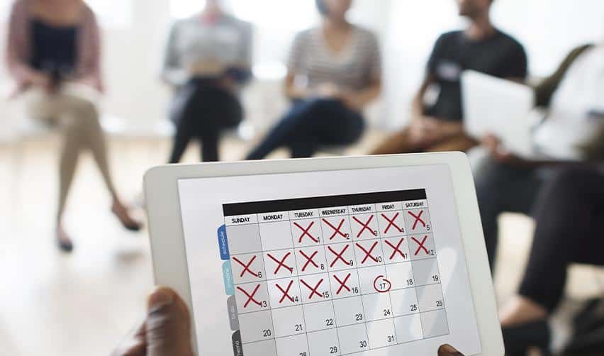 Image of a digital calendar with certain dates crossed off and marked, symbolizing how the EB5AN and Lawfully partnership help EB5 investors keep track of important dates and deadlines.