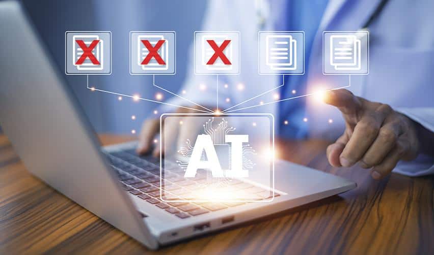 A laptop screen displaying AI icons with red flags on documents, illustrating how AI can identify inconsistencies and warning signs in EB5 project materials.